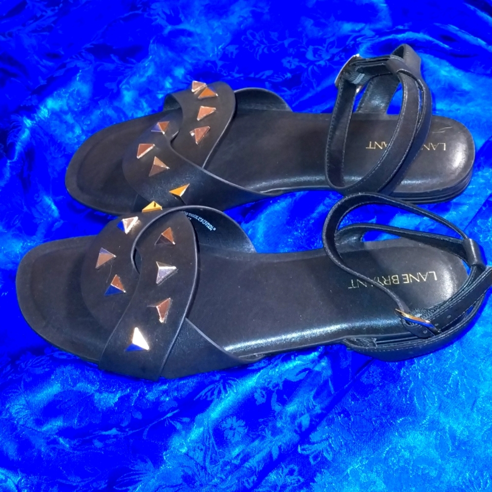 Black and gold sandals